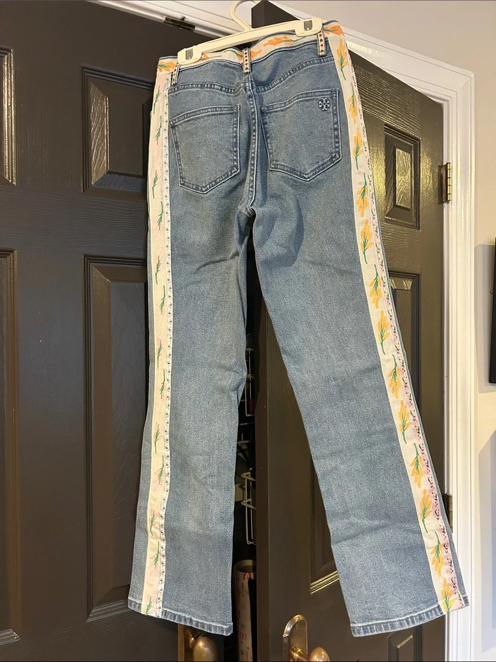 Tory Burch Light Blue Straight Leg Jeans with Gold Button and Ribbon Detail